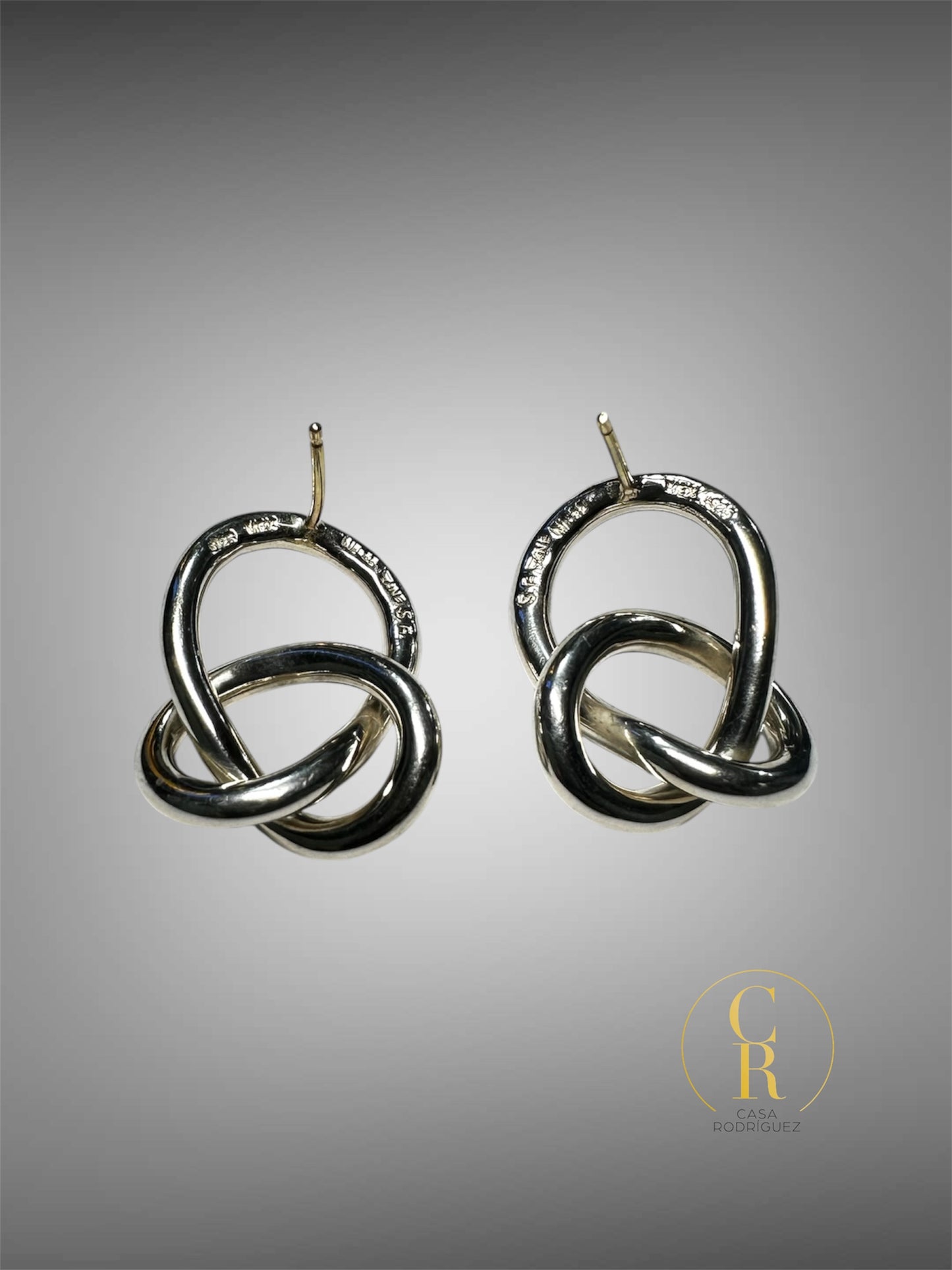 Aretes Tane Entrelazados.
