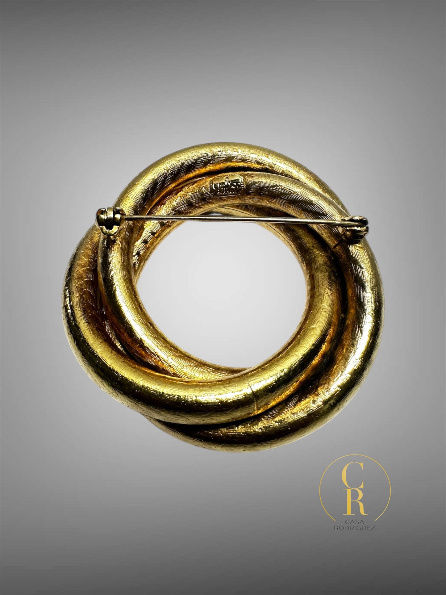 Broche Christian Dior Triple Entrelazado.