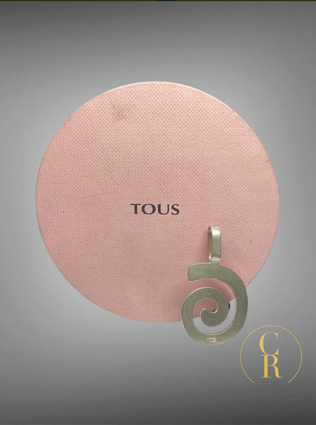 Dije Tous Caracol